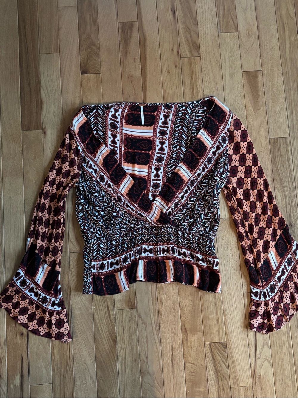 Free People Mixed Print V-Neck Bell Sleeve Top in Rust, Black, Cream